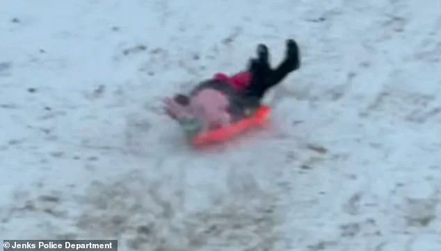 Viral Video Shows Oklahoma Officer's Unintended Sled Ride into Child, Highlights Winter Safety Risks