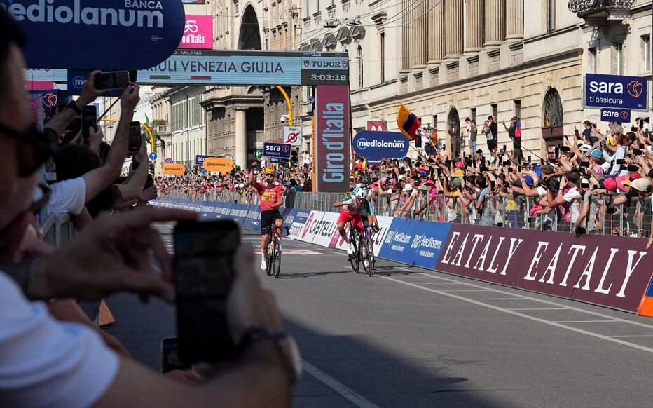 Giro d'Italia jury disqualifies Enrico Zanoncello for dangerous helmet strike.