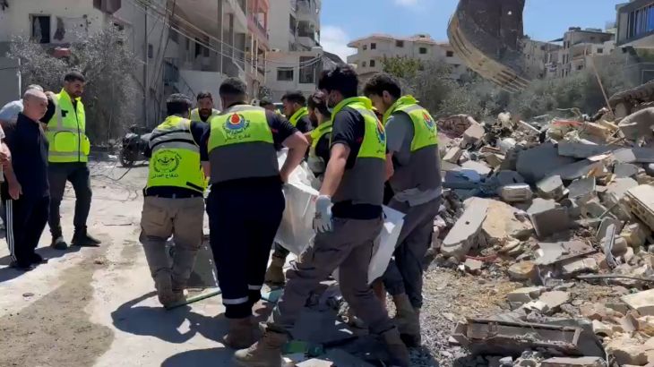 Israeli forces intercept Hezbollah missile barrage causing visible damage in Kiryat Shmona